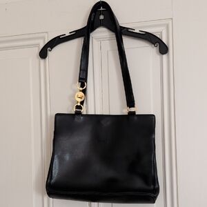 Black Leather Lancel Paris Shoulder Bag with Gold Accents